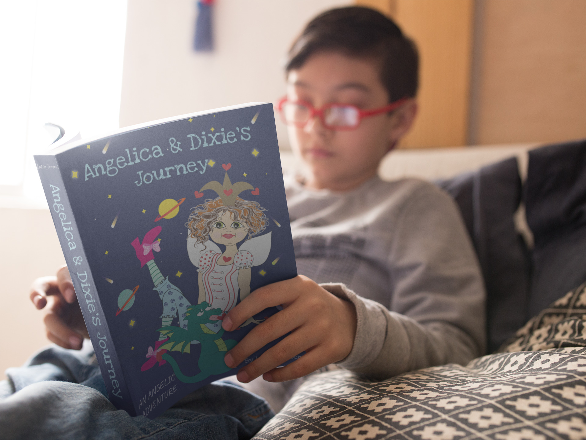 Boy reading Angelica & Dixie